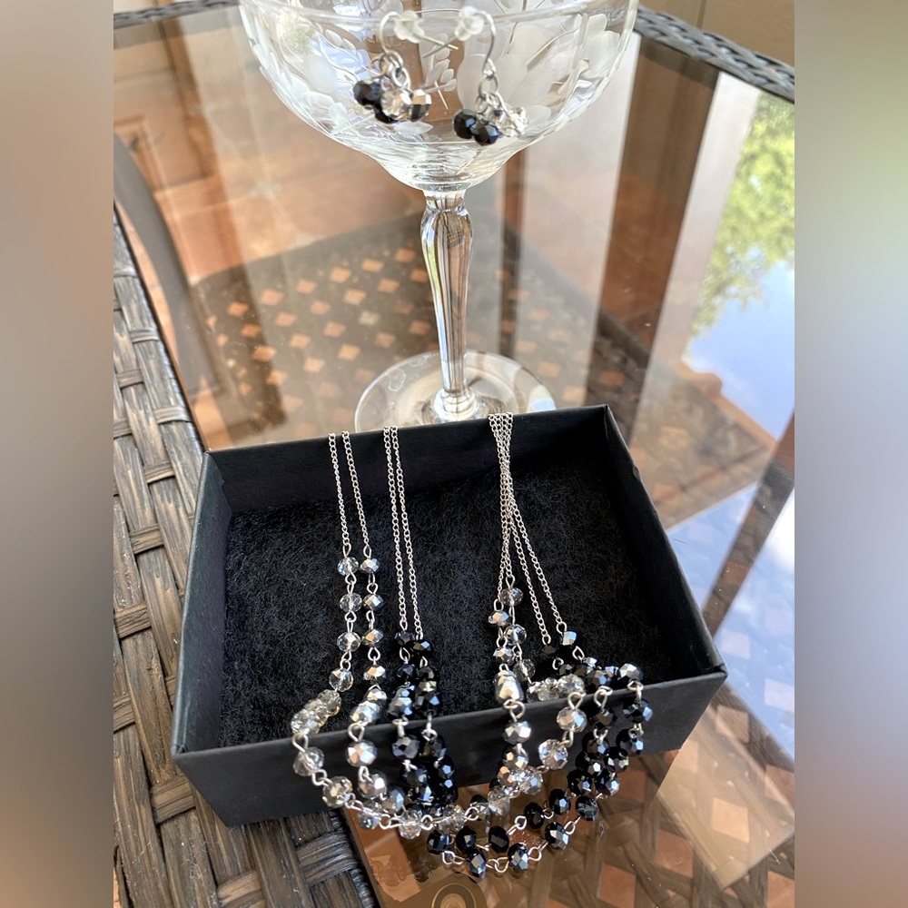 4 strand glass beads, silver toned necklace w/earrings.